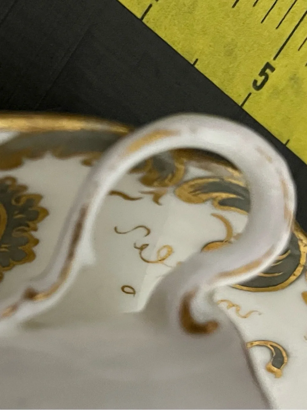 Elegant White and Gold Porcelain Teacup and Saucer from Wales England